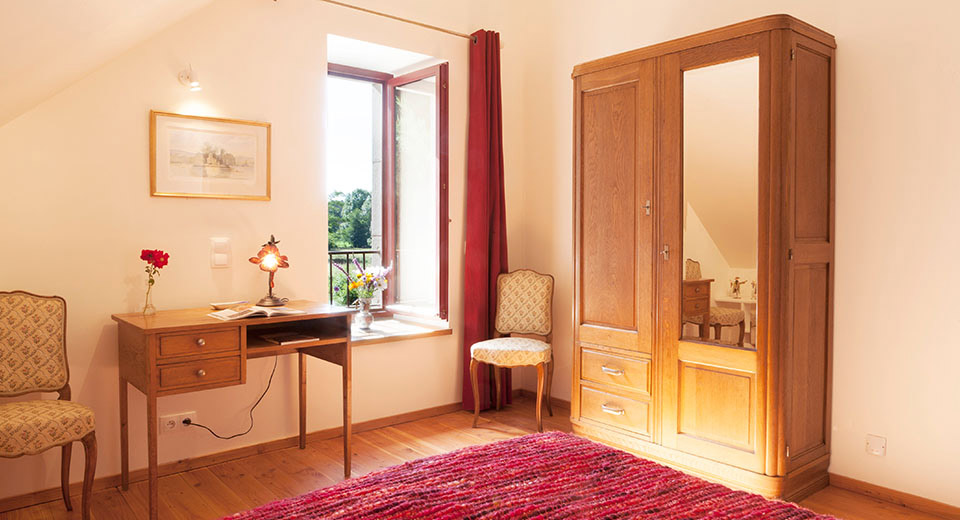 An additional double bed bedroom in the main house, for the "True French Experience" offering