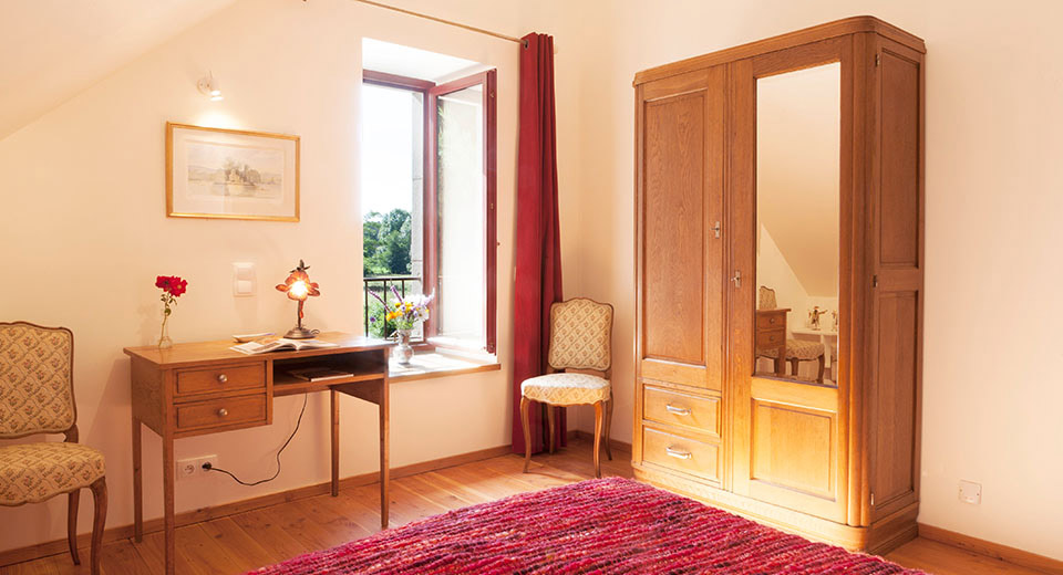 An additional double bed bedroom in the main house, for the "True French Experience" offering