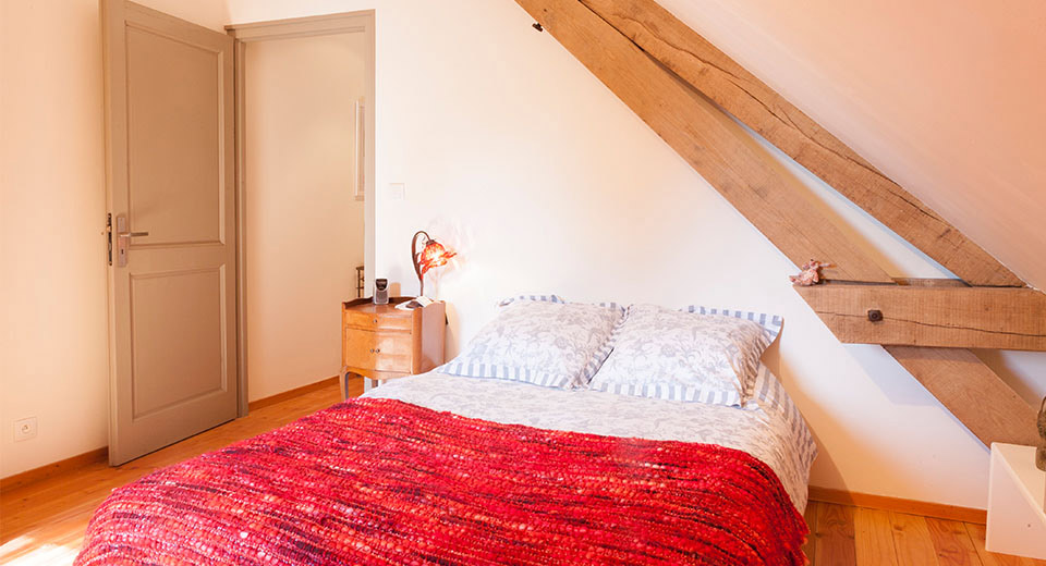 An additional double bed bedroom in the main house, for the "True French Experience" offering